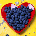 Red heart plate with blueberries